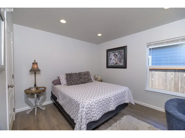 a bathroom with a sink toilet and mirror