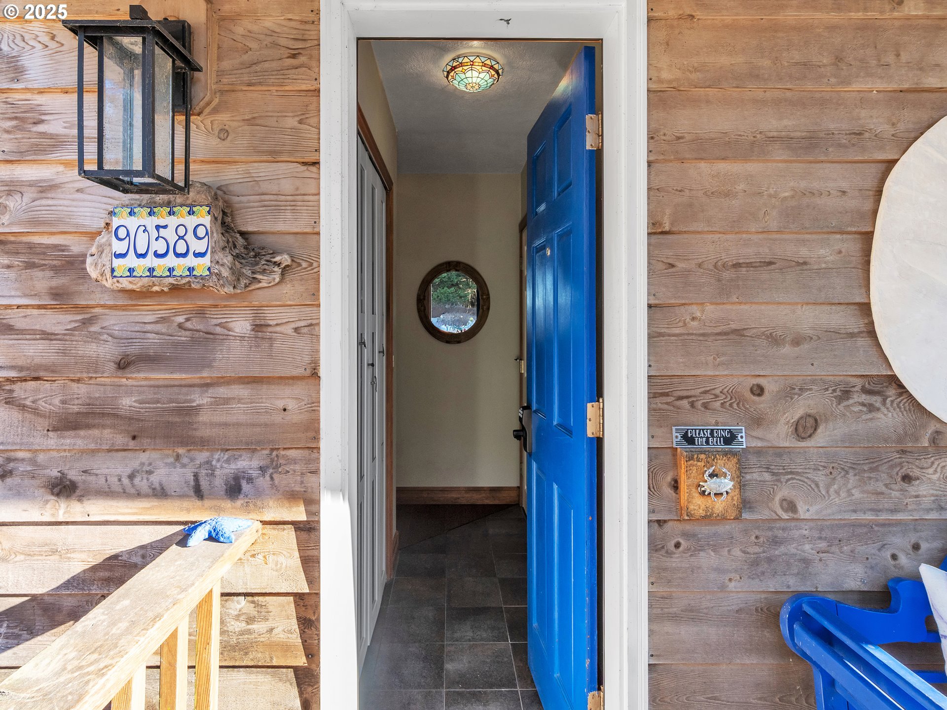 90589 Clark Road Warrenton, OR 97146 - Photo 11 of 48 a view of a hallway with seating area