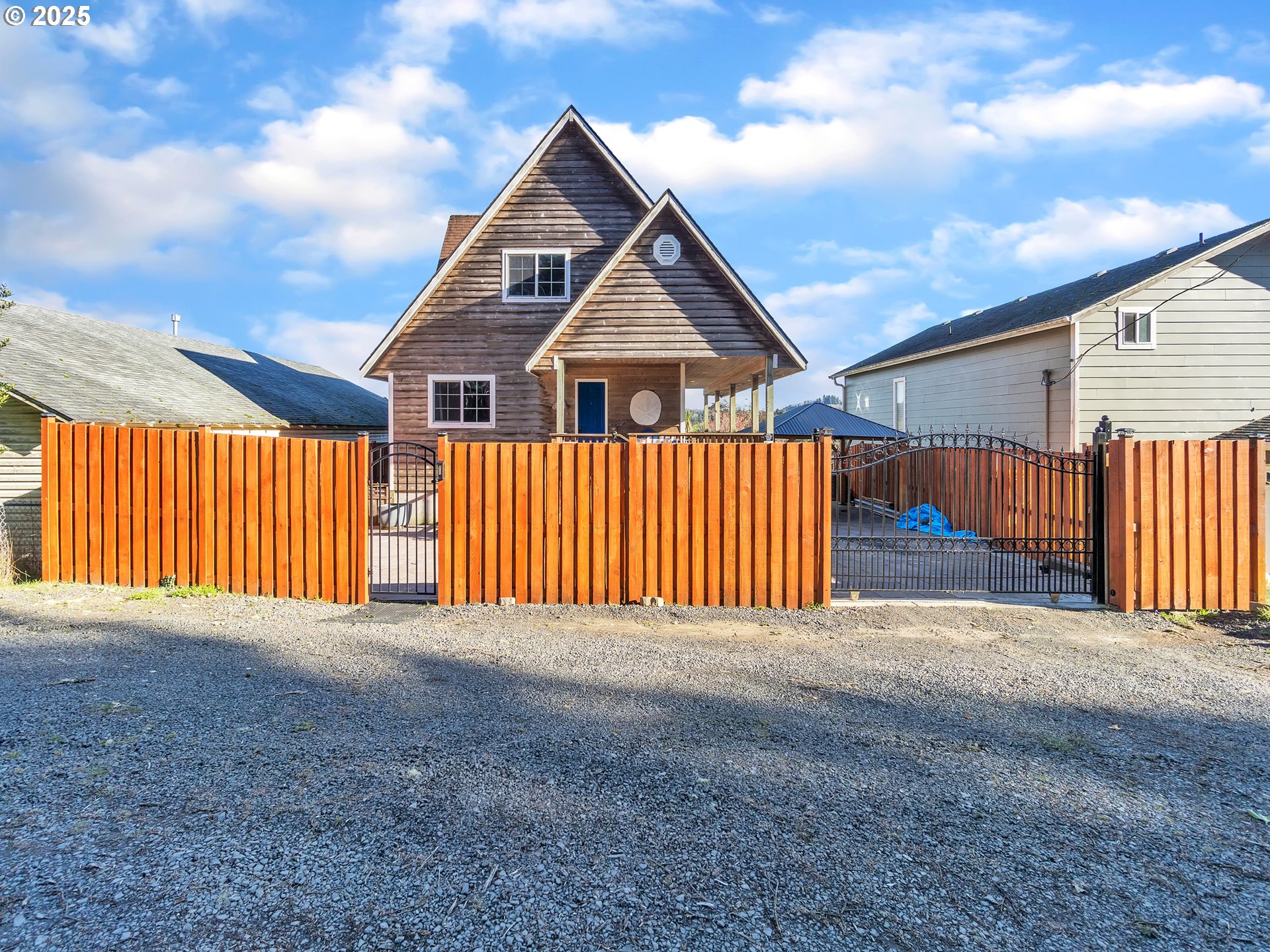 90589 Clark Road Warrenton, OR 97146 - Photo 2 of 48 a view of the house with a yard