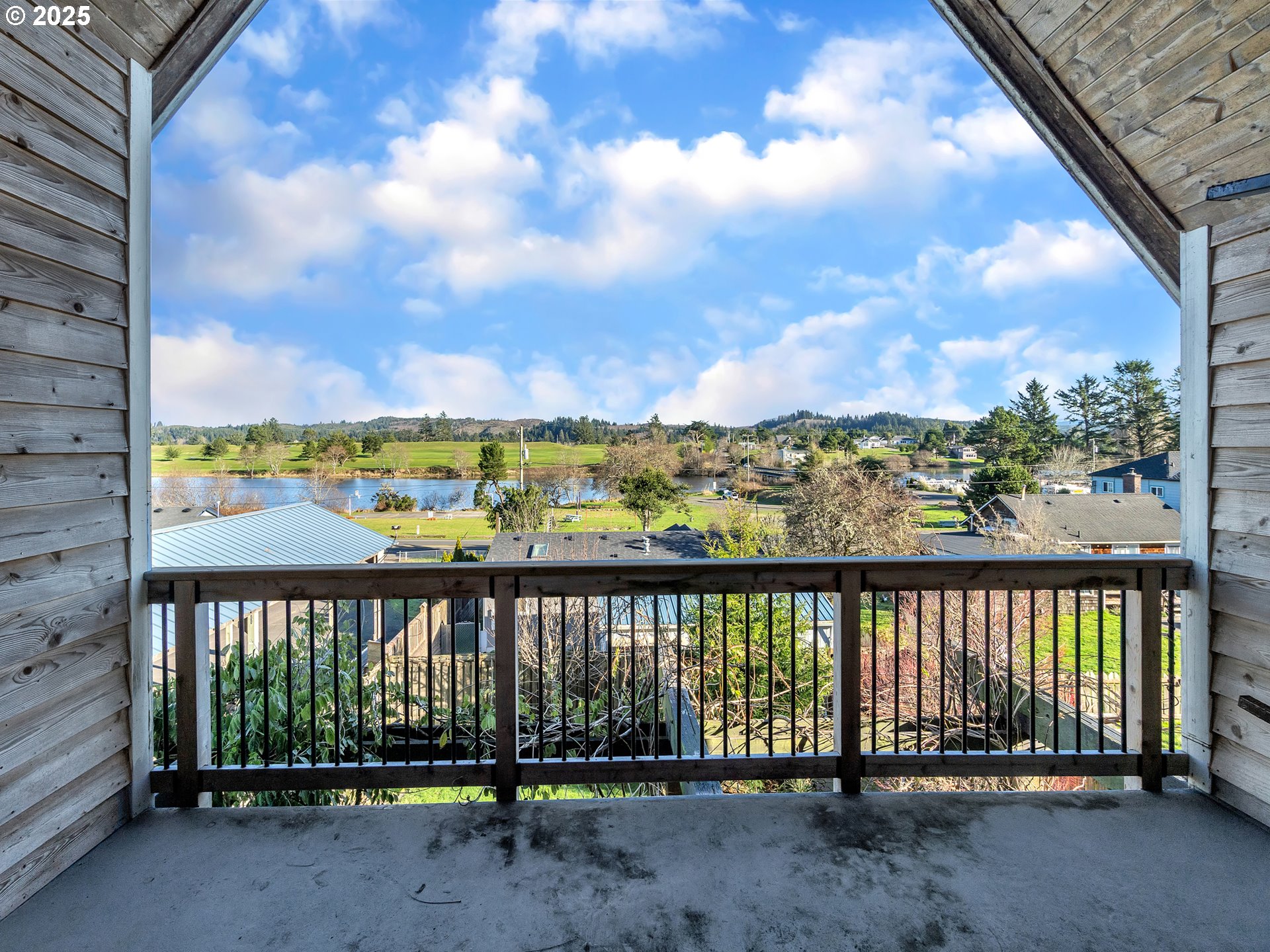 90589 Clark Road Warrenton, OR 97146 - Photo 21 of 48 a view of a lake with a outdoor space