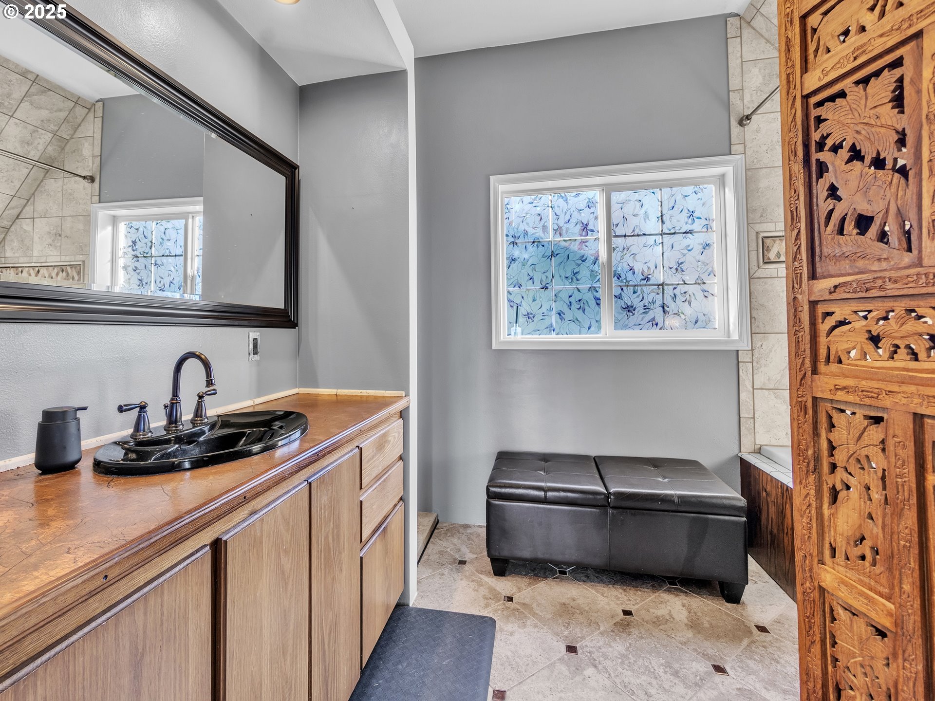 90589 Clark Road Warrenton, OR 97146 - Photo 24 of 48 a kitchen with stainless steel appliances a sink a stove and a window