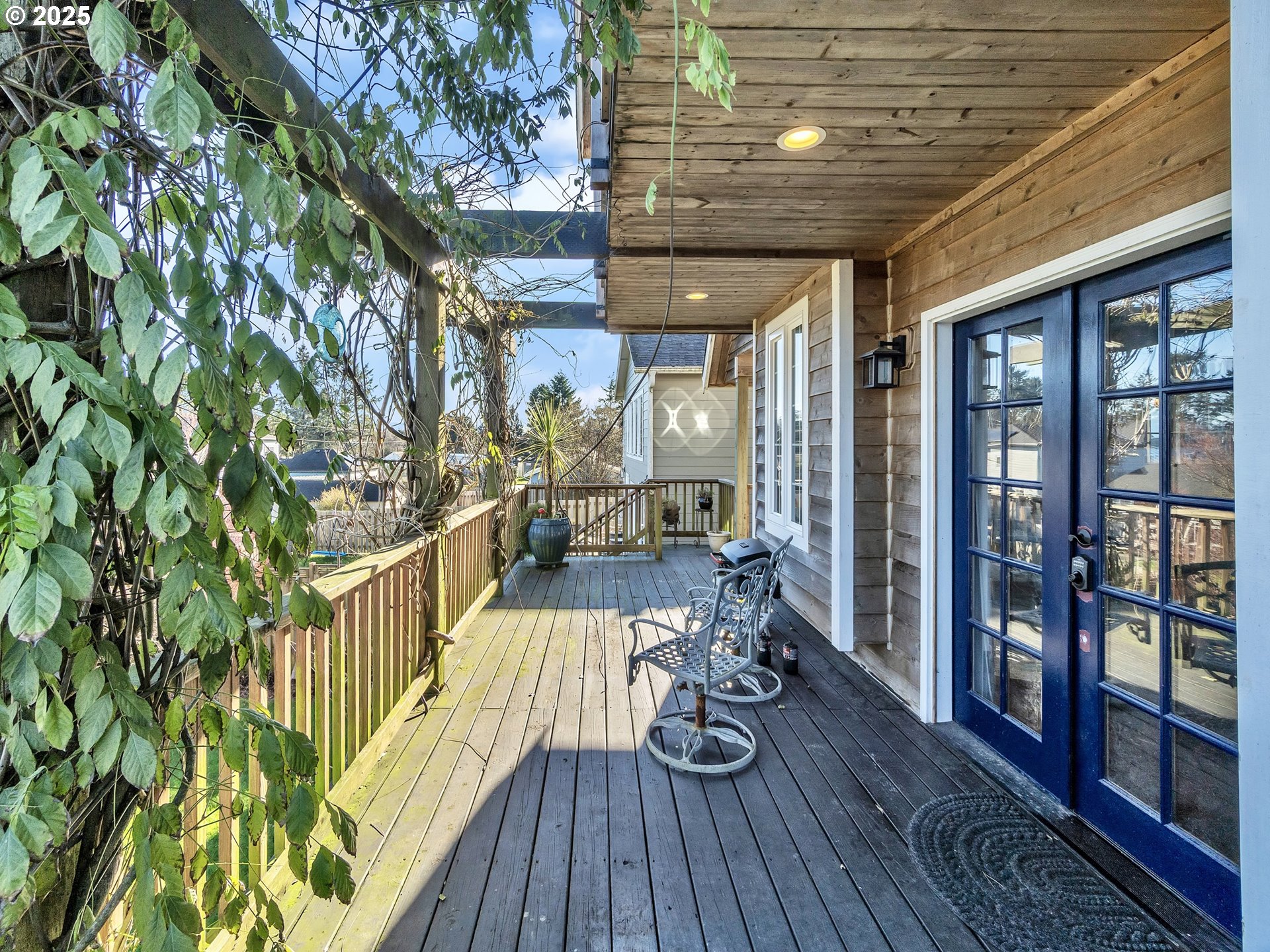 90589 Clark Road Warrenton, OR 97146 - Photo 37 of 48 a outdoor space with patio lots of furniture and wooden floor