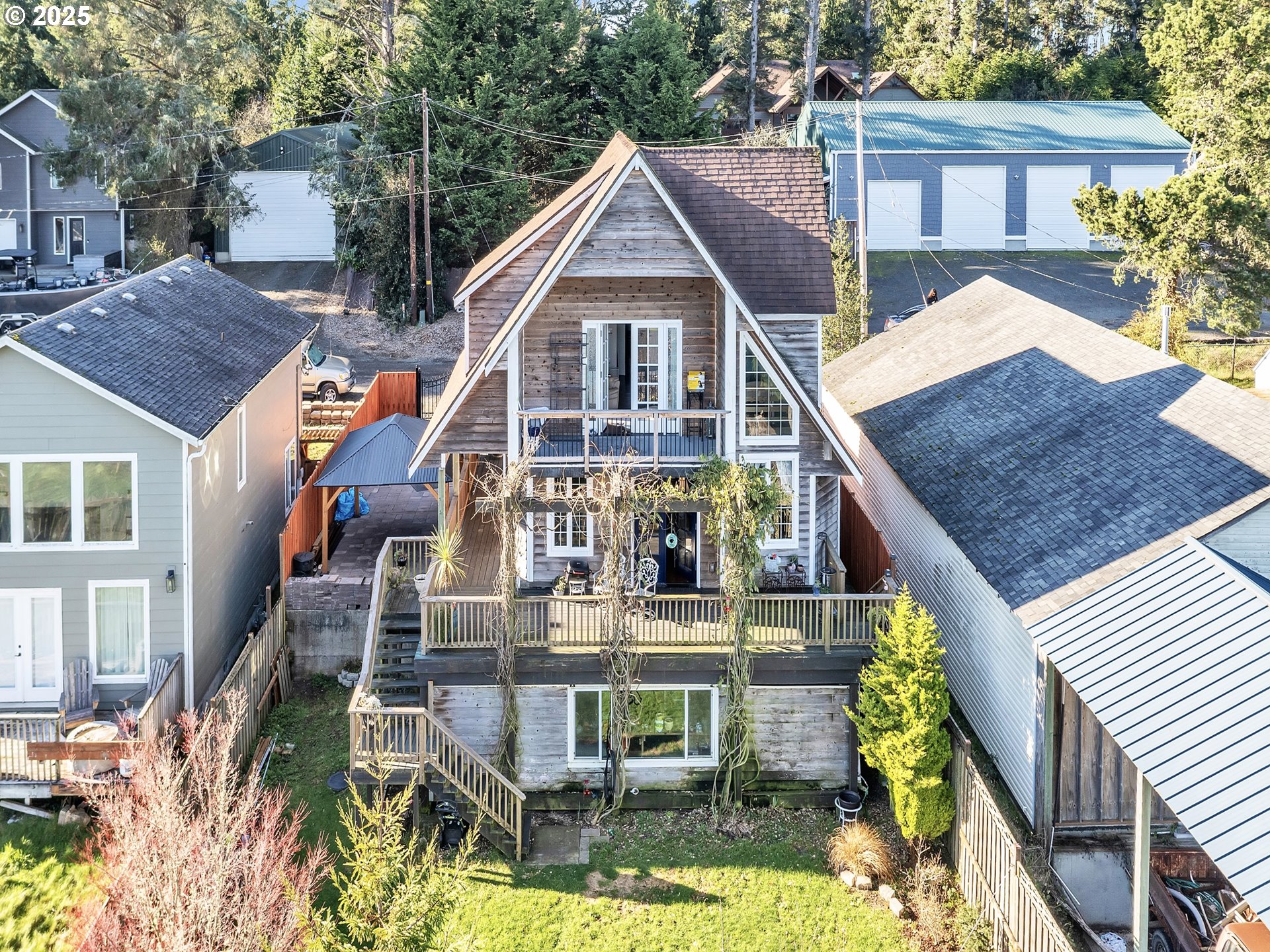 90589 Clark Road Warrenton, OR 97146 - Photo 42 of 48 a aerial view of a house with a yard