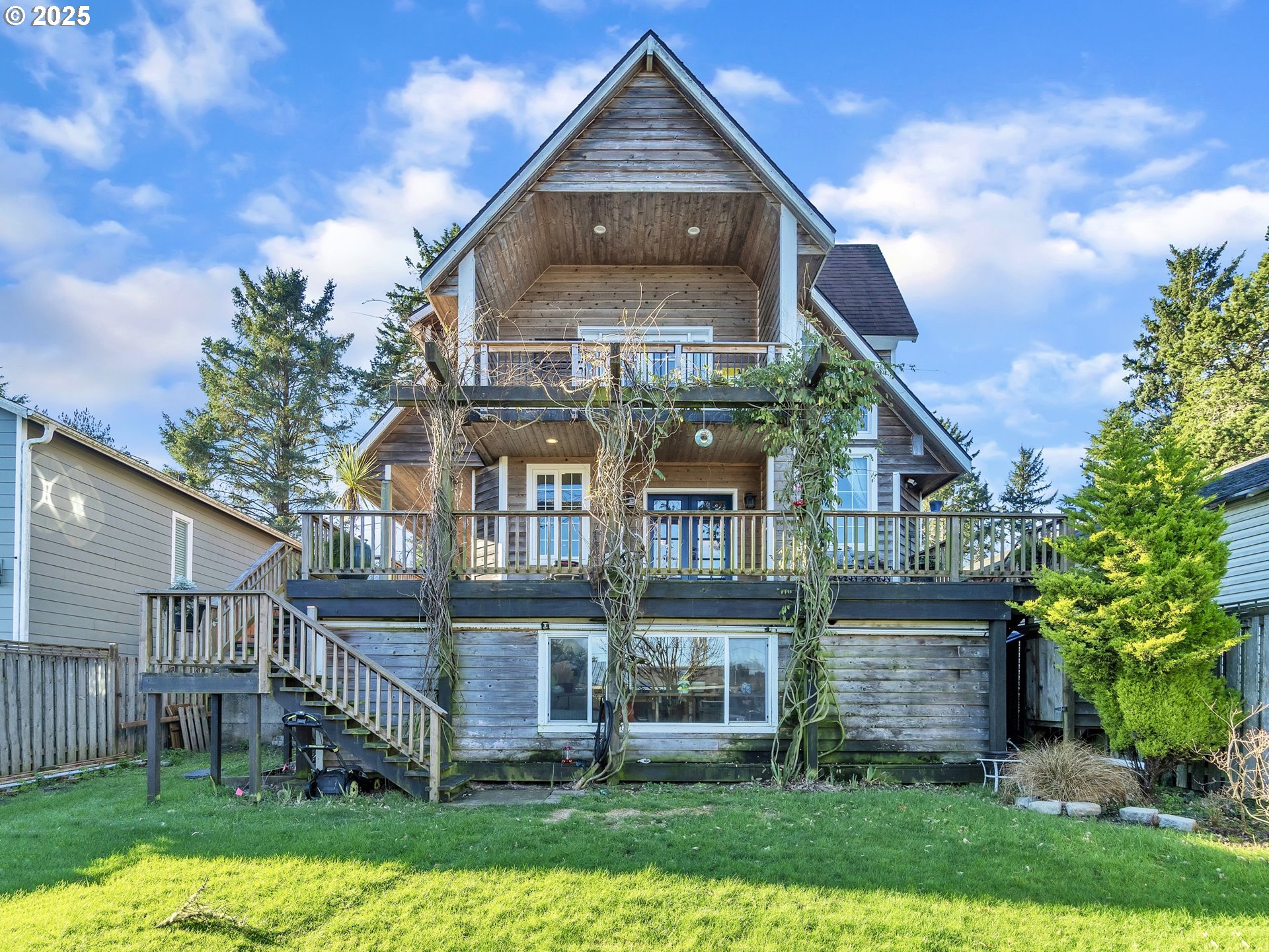 90589 Clark Road Warrenton, OR 97146 - Photo 43 of 48 front view of house with a yard