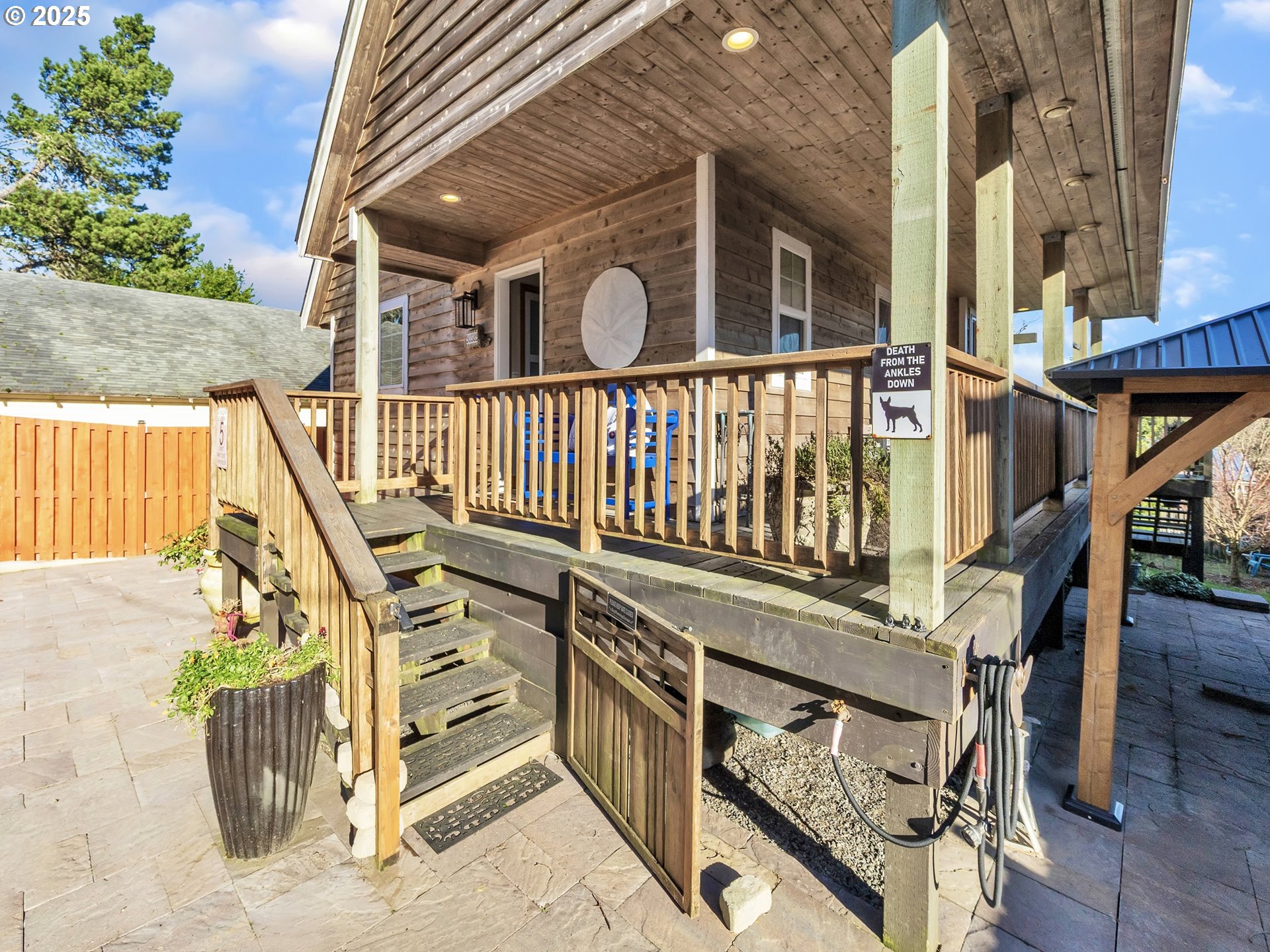 90589 Clark Road Warrenton, OR 97146 - Photo 7 of 48 a view of balcony with wooden floor and fence