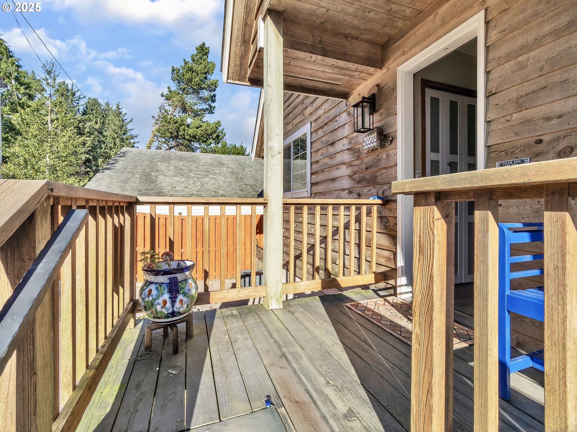 90589 Clark Road Warrenton, OR 97146 - Photo 8 of 48 a view of balcony and deck with wooden floor and fence