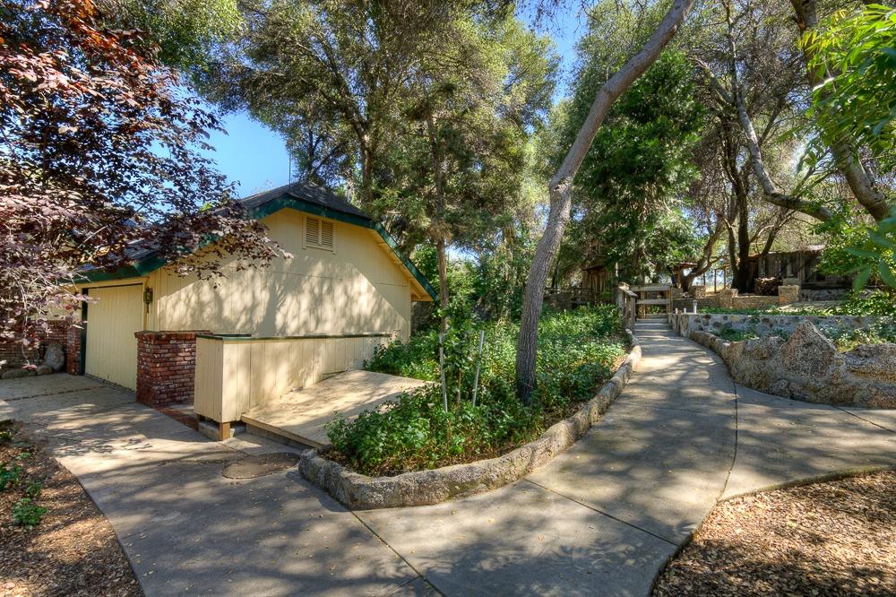 31514 Delaware Road Coarsegold, CA 93614 - Photo 31 of 49 Rock path leads to a special back yard.
