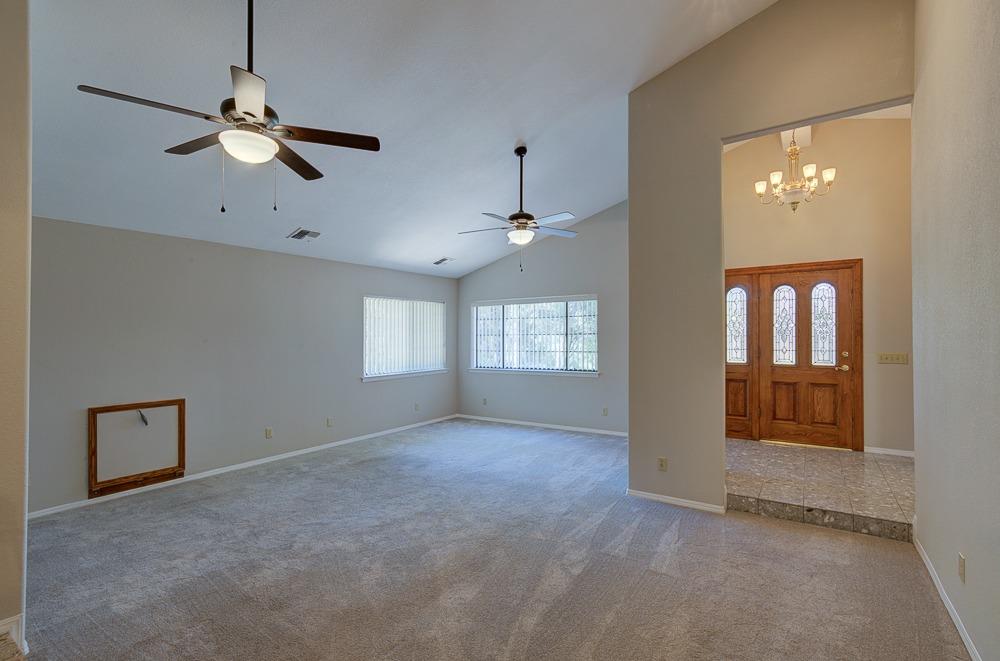 31514 Delaware Road Coarsegold, CA 93614 - Photo 5 of 49 Living room with a firewood storage box built in.
