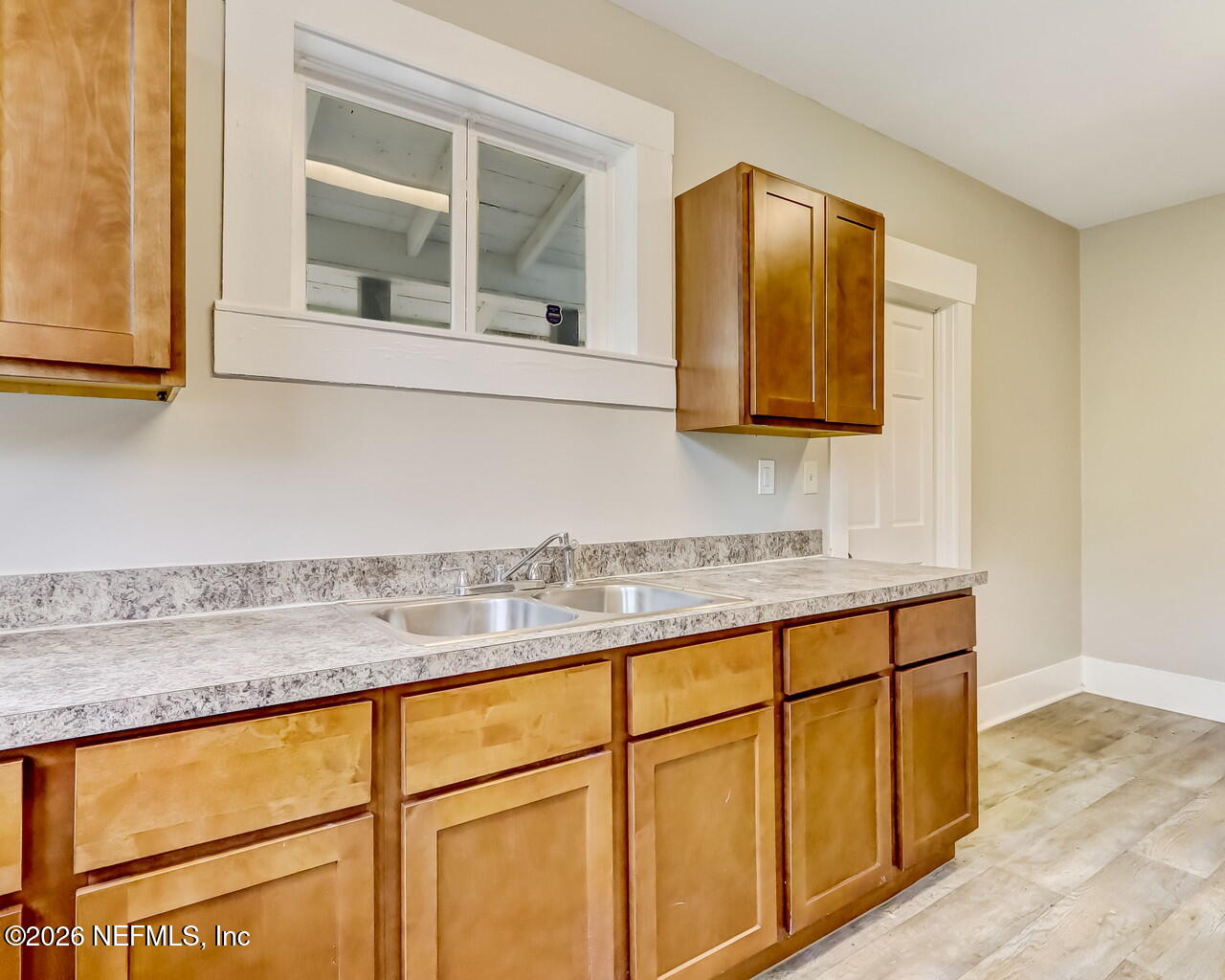 4325 Springfield Boulevard Jacksonville, FL 32206 - Photo 18 of 33 a bathroom with a sink and a mirror