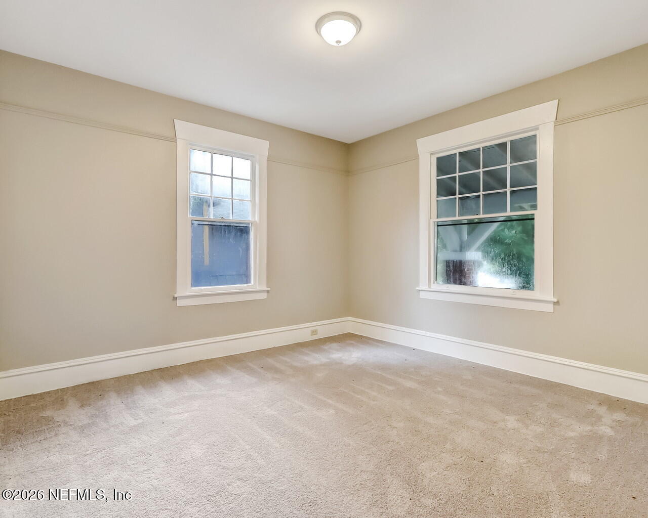 4325 Springfield Boulevard Jacksonville, FL 32206 - Photo 20 of 33 an empty room with windows