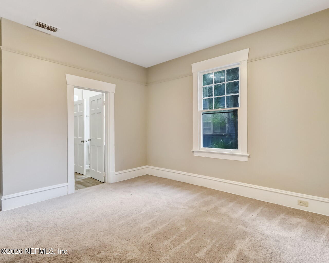 4325 Springfield Boulevard Jacksonville, FL 32206 - Photo 21 of 33 an empty room with windows