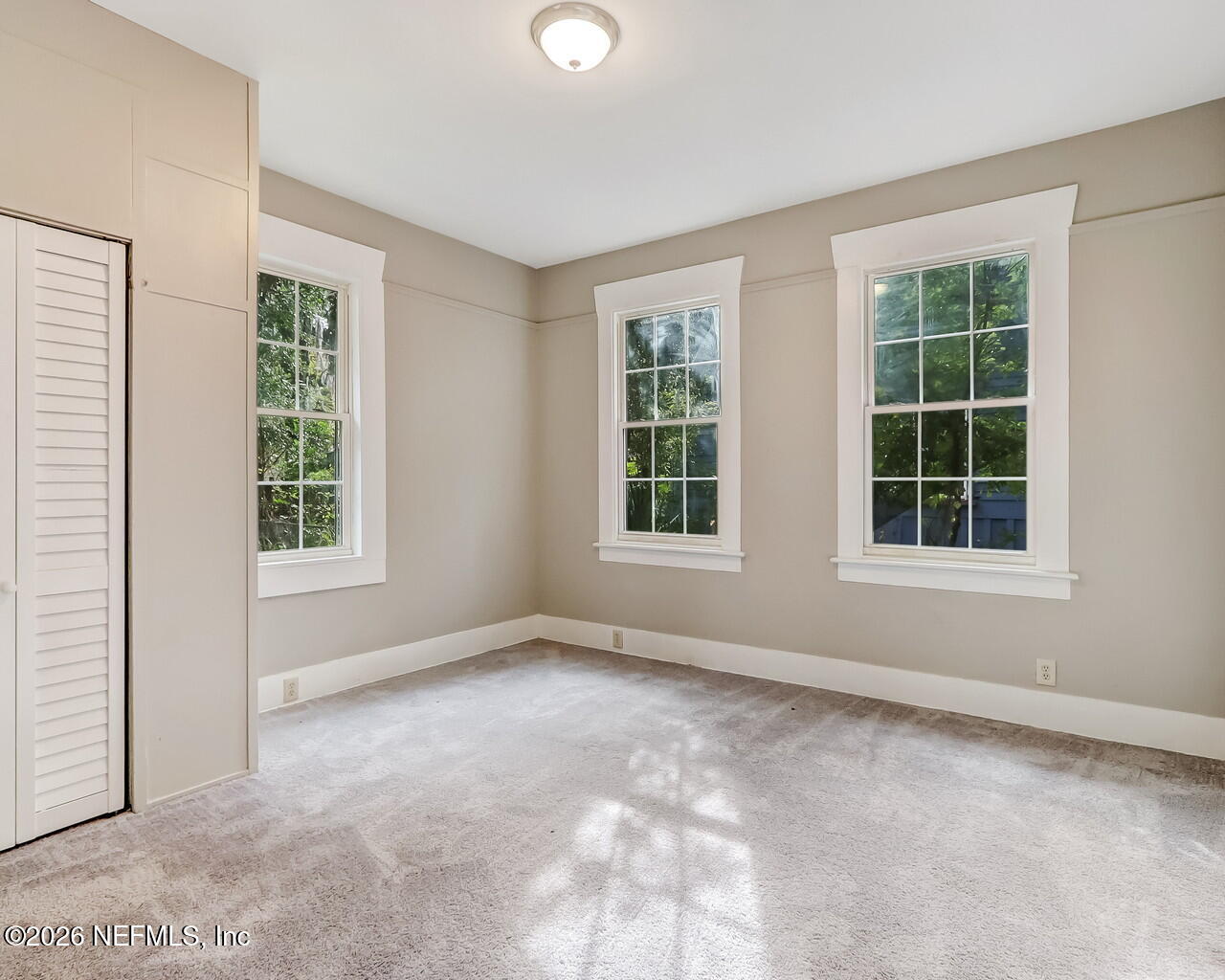 4325 Springfield Boulevard Jacksonville, FL 32206 - Photo 29 of 33 an empty room with windows