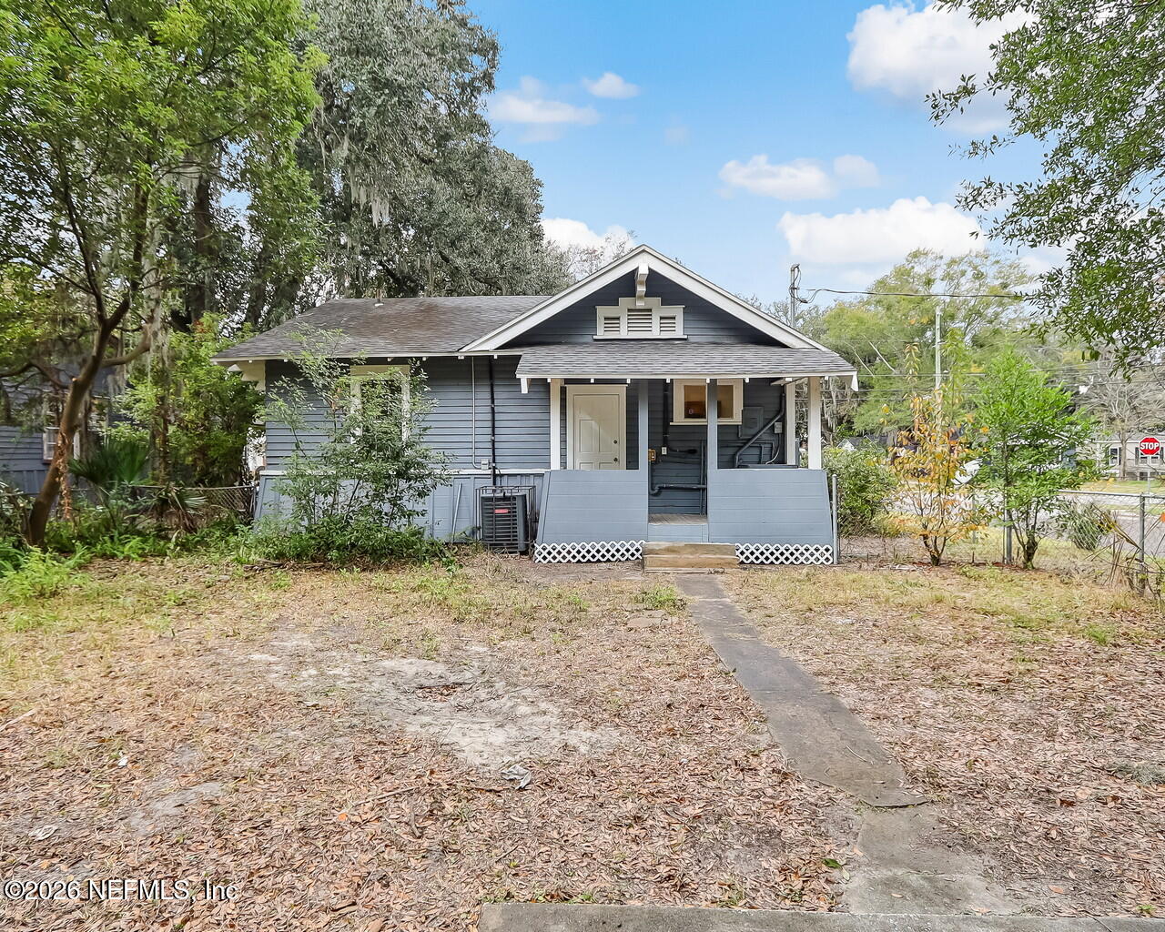 4325 Springfield Boulevard Jacksonville, FL 32206 - Photo 31 of 33 a front view of a house with a yard and trees