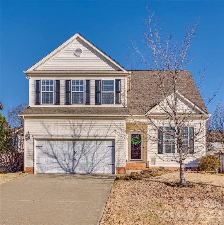 106 Anchura Road Fort Mill, SC 29708 - Photo 1 of 30 a front view of a house with a yard