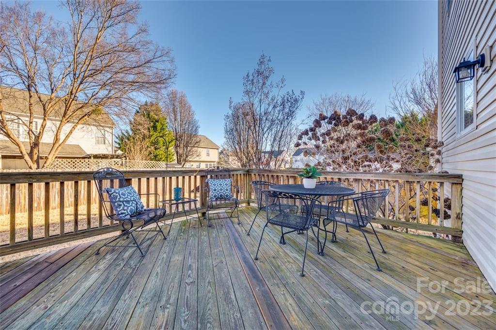 106 Anchura Road Fort Mill, SC 29708 - Photo 27 of 30 a view of a chairs on wooden deck