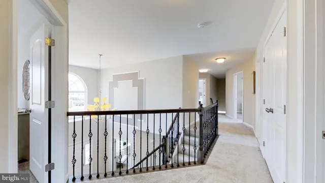 a view of a hallway with a window