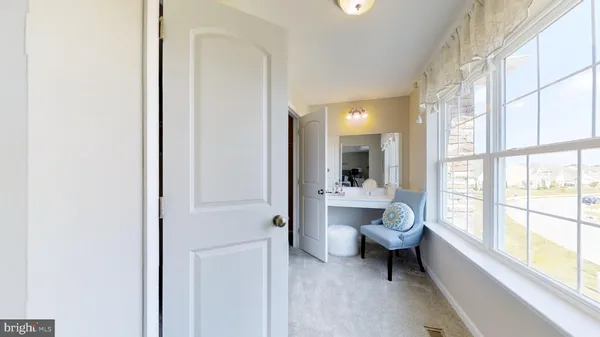 a bathroom with a bathtub shower and toilet
