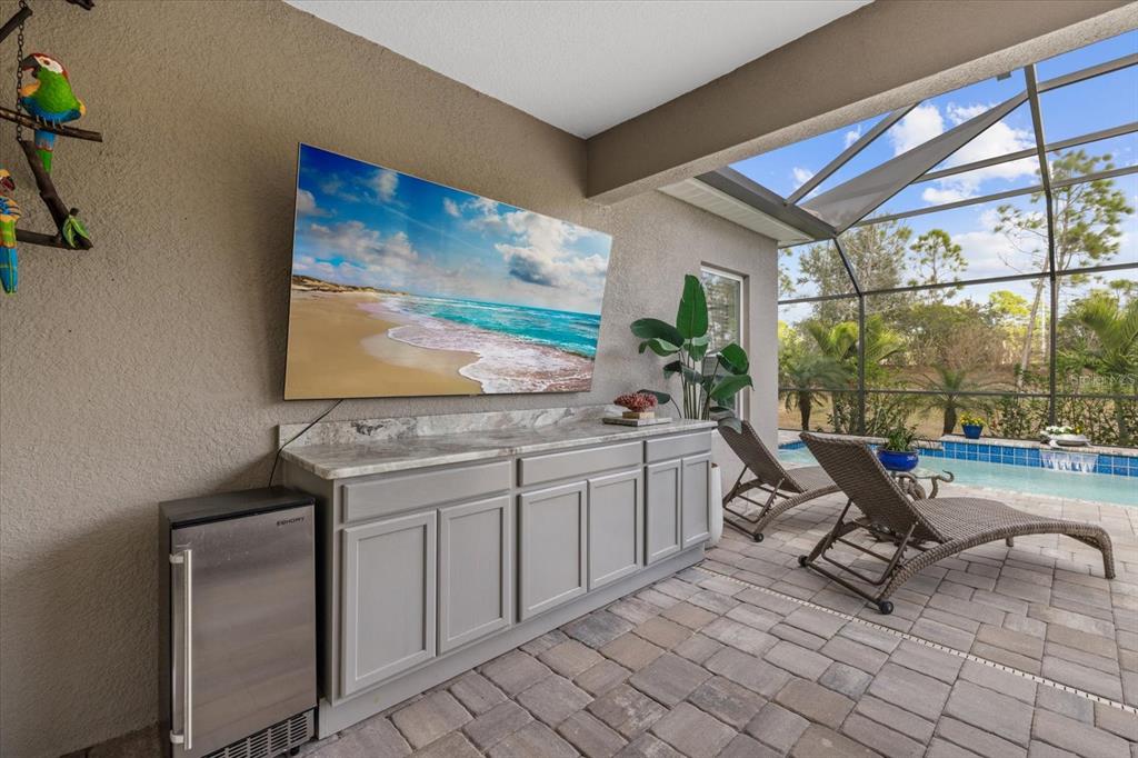 13185 Steinhatchee Loop Venice, FL 34293 - Photo 38 of 50 a view of a living room and workspace