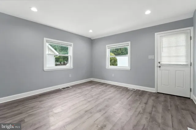 an empty room with windows