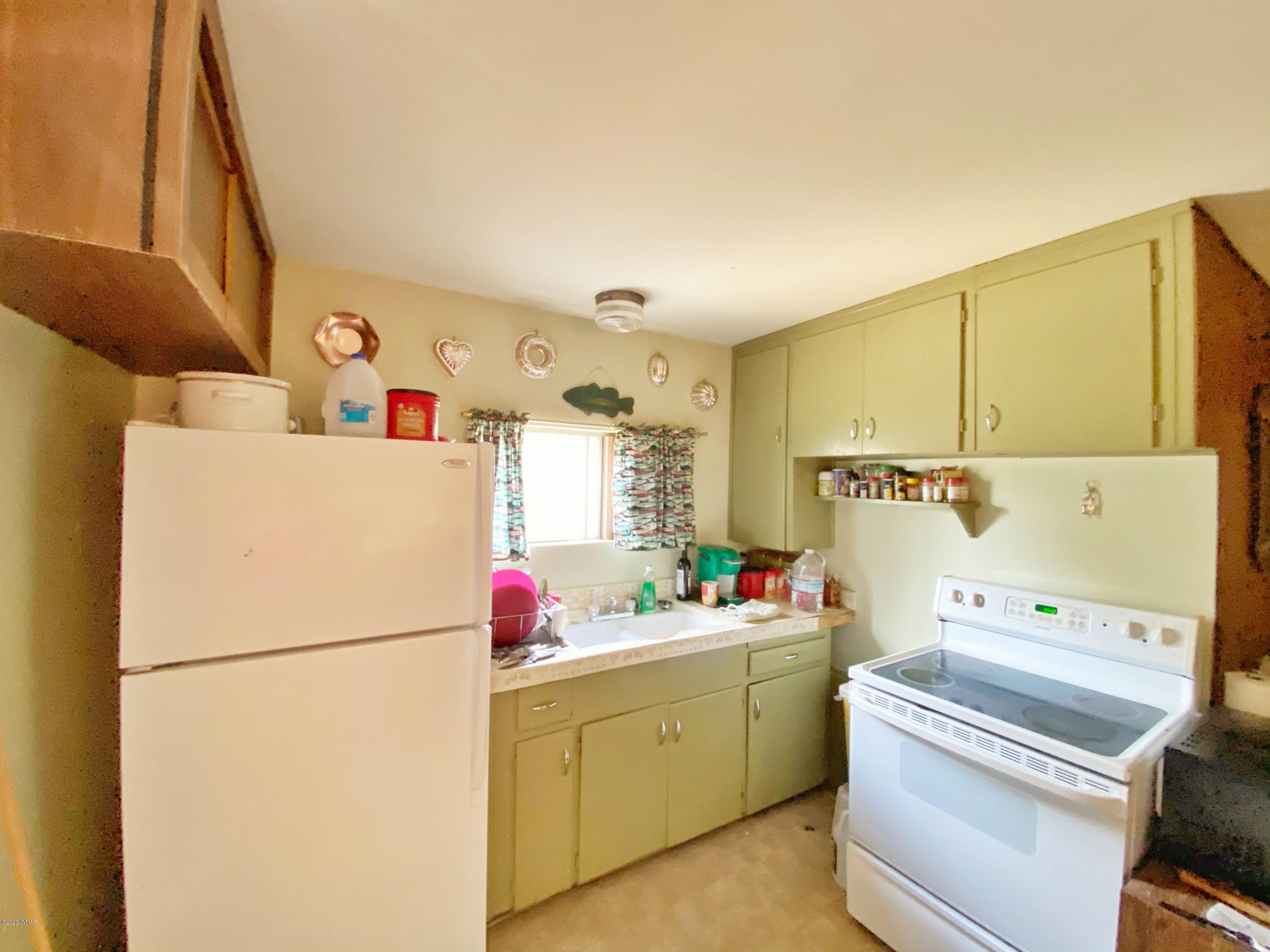 2056 Chevelon Road Overgaard, AZ 85933 - Photo 3 of 10 a utility room with dryer and washer