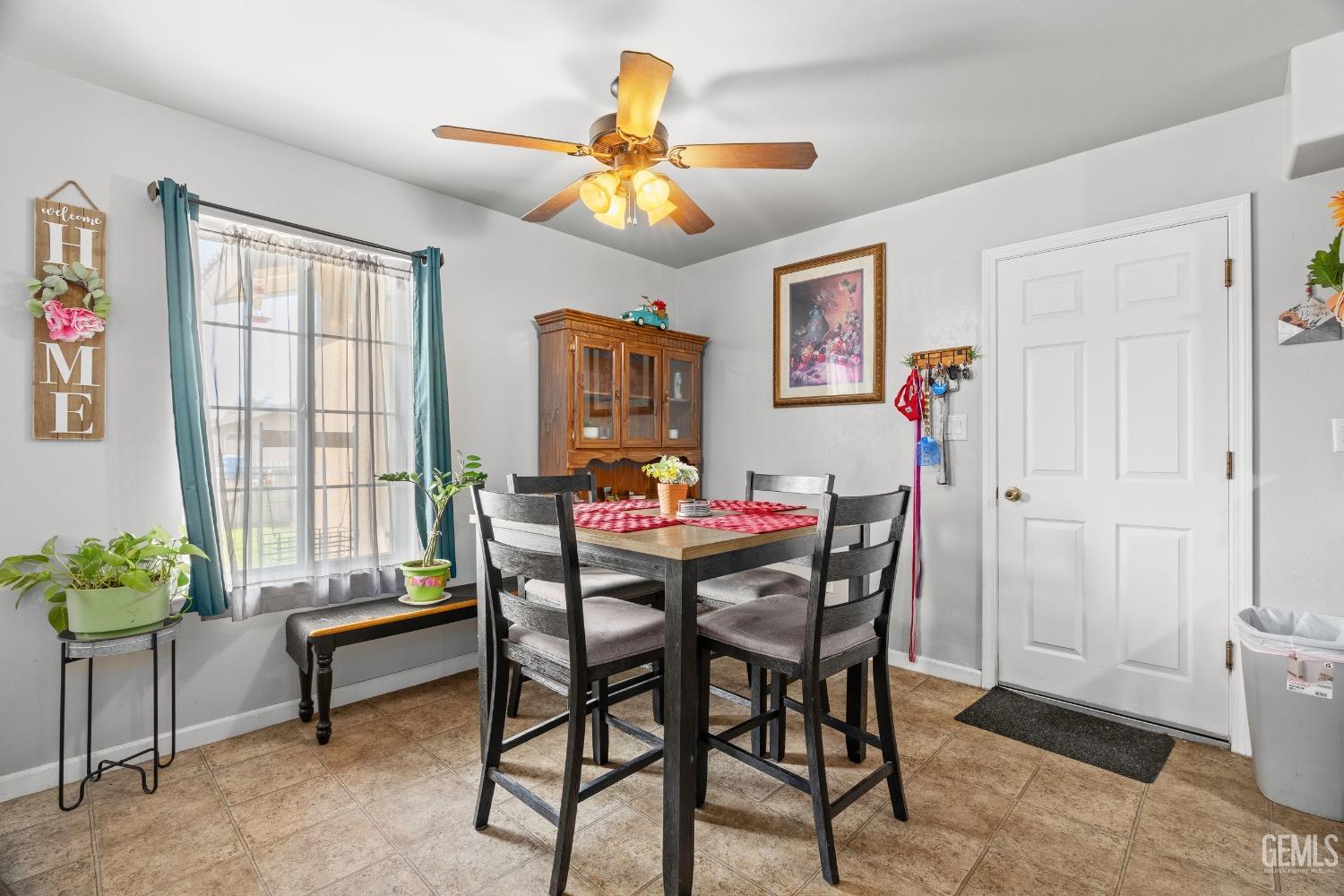 Undisclosed Address Arvin, CA 93203 - Photo 14 of 33 a dining room with furniture and window