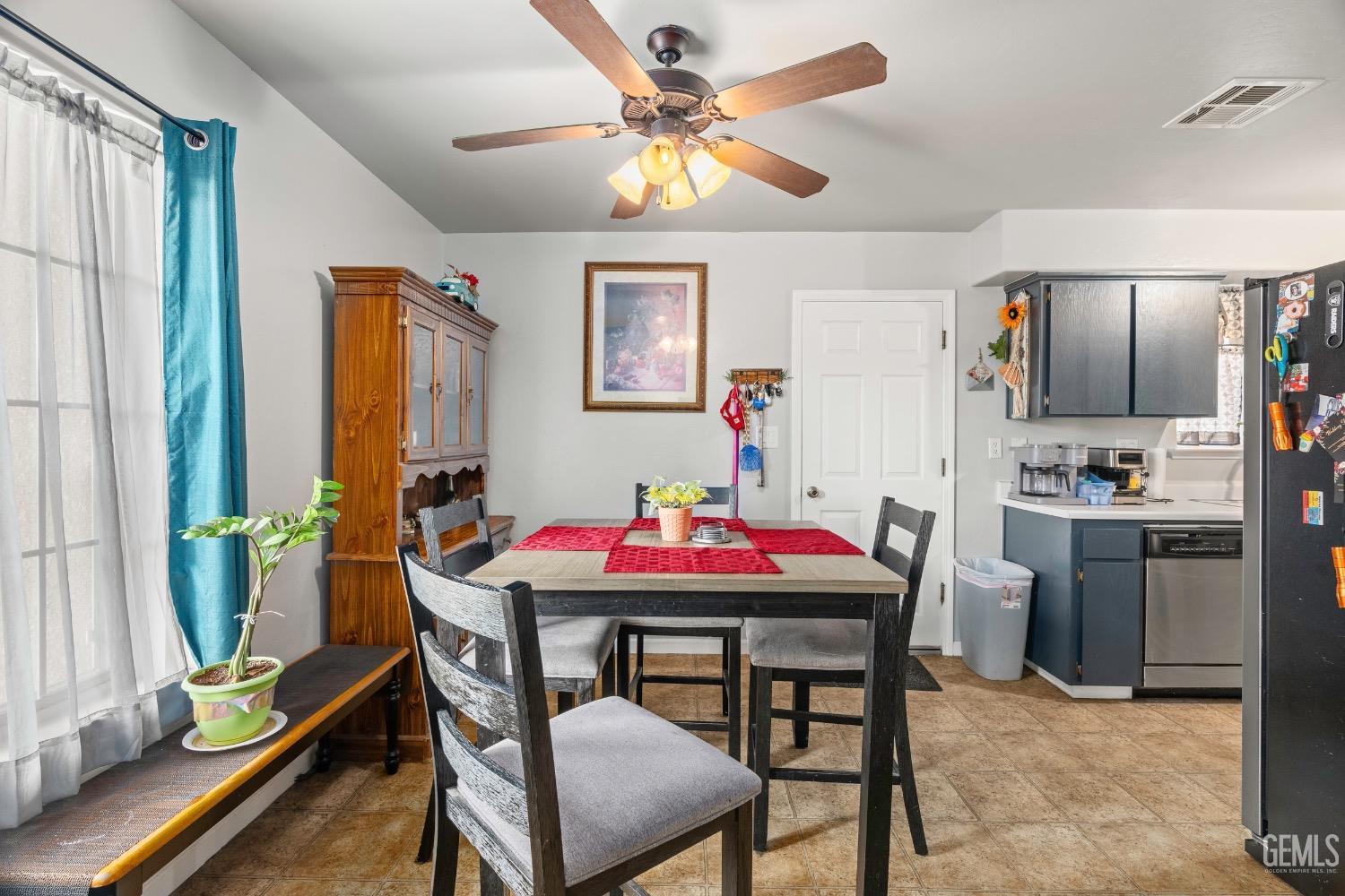 Undisclosed Address Arvin, CA 93203 - Photo 15 of 33 a dining room with furniture and window