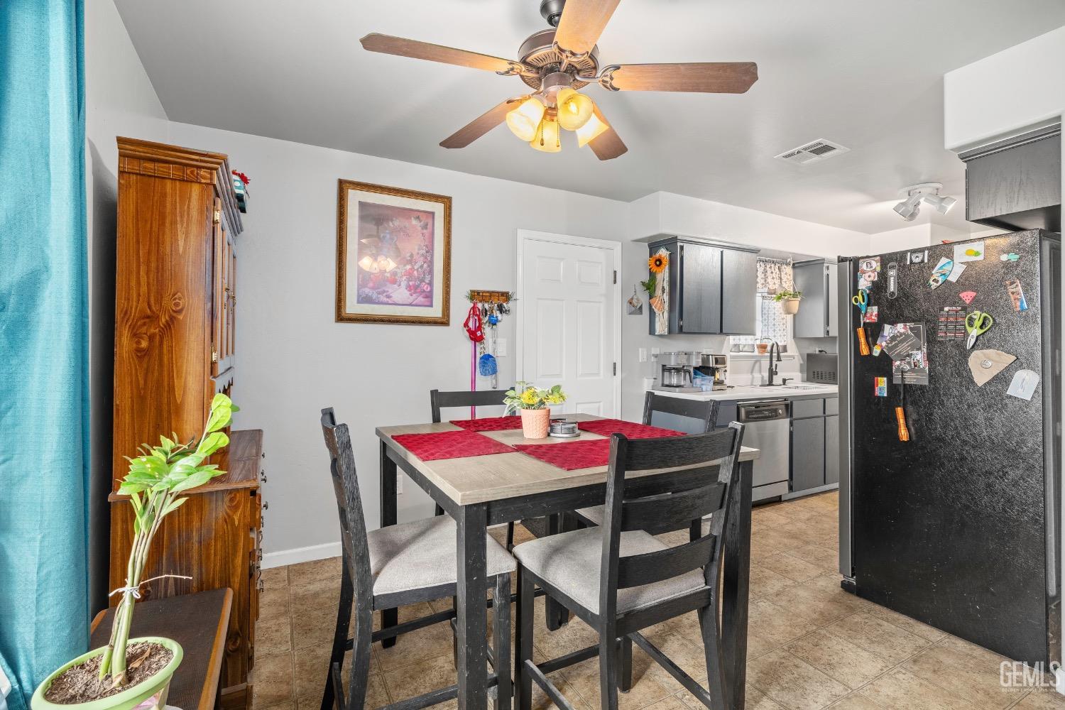 Undisclosed Address Arvin, CA 93203 - Photo 16 of 33 a view of a dining room with furniture and chandelier