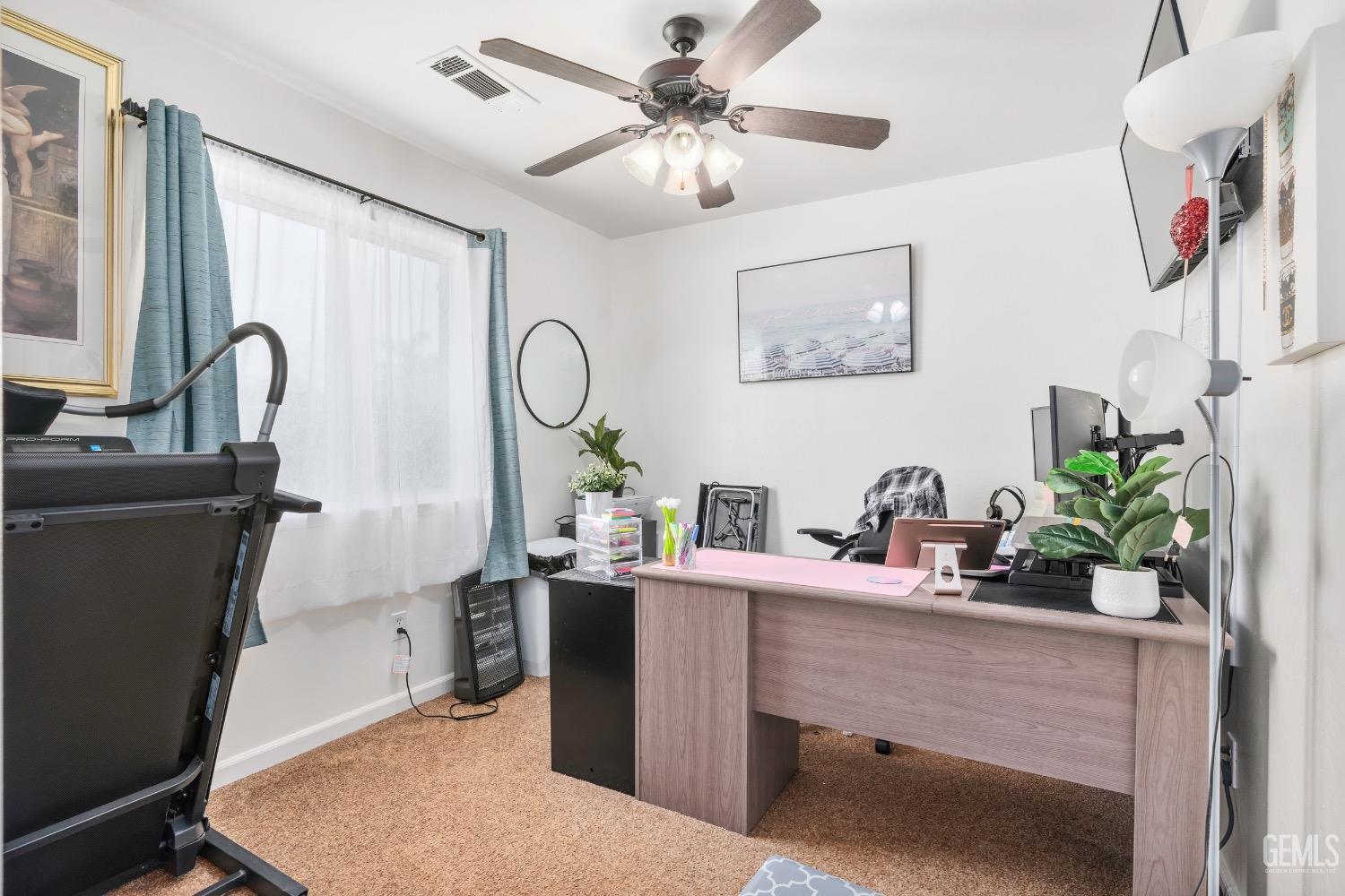 Undisclosed Address Arvin, CA 93203 - Photo 18 of 33 a room with cabinets a sink and a window