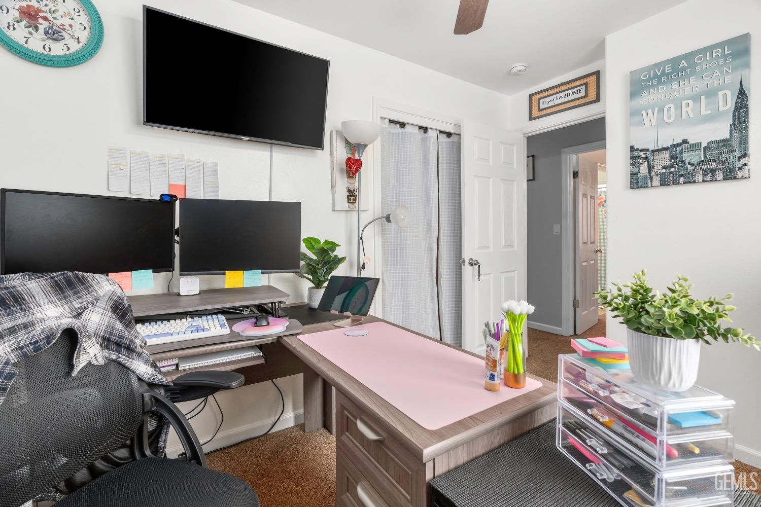 Undisclosed Address Arvin, CA 93203 - Photo 20 of 33 a living room with furniture and a flat screen tv