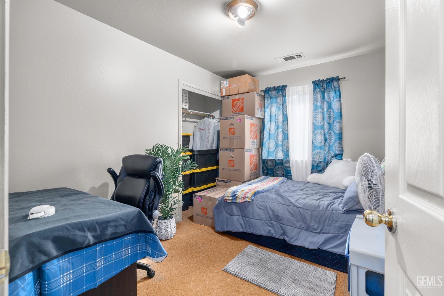 Undisclosed Address Arvin, CA 93203 - Photo 25 of 33 a bedroom with bed and window