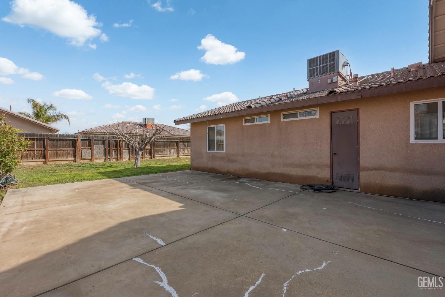 Undisclosed Address Arvin, CA 93203 - Photo 26 of 33 a view of a house with a backyard