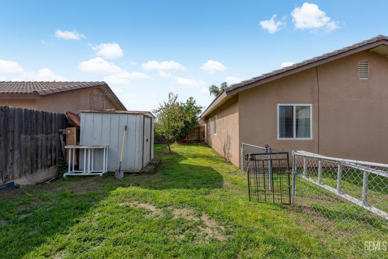 Undisclosed Address Arvin, CA 93203 - Photo 27 of 33 a house view with a backyard space