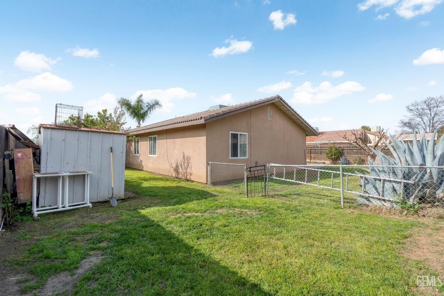 Undisclosed Address Arvin, CA 93203 - Photo 33 of 33 a backyard of a house with table and chairs