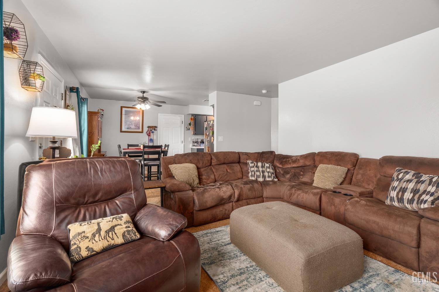 Undisclosed Address Arvin, CA 93203 - Photo 9 of 33 a living room with furniture and a couch