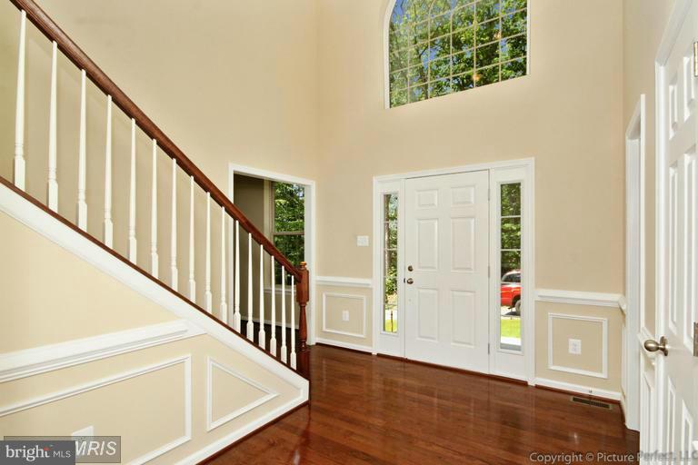 276 Ridgecrest Road New Market, MD 21774 - Photo 6 of 10 a view of an entryway with wooden floor