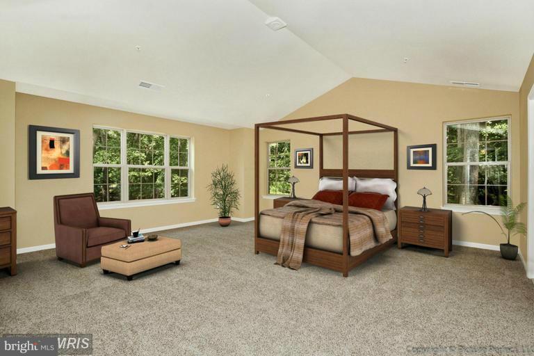 276 Ridgecrest Road New Market, MD 21774 - Photo 9 of 10 a spacious bedroom with a bed and large window