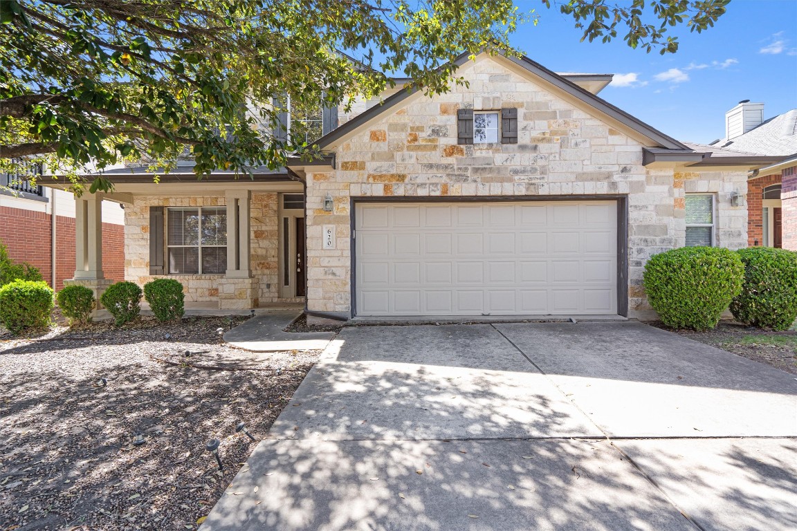 620 Middle Creek Drive Buda, TX 78610 - Photo 1 of 1 a view of a house with a yard and garage