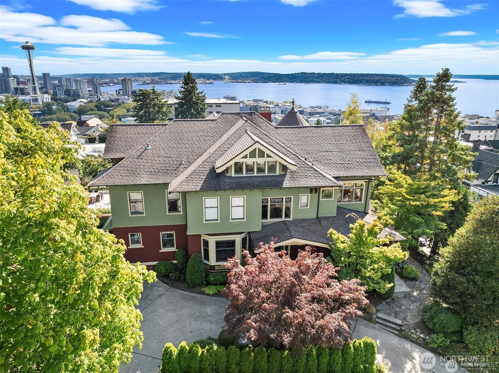 103 Highland Drive Seattle, WA 98109 - Photo 1 of 1 a aerial view of a house next to a yard
