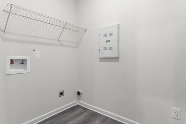 a view of small space with empty racks on the wall