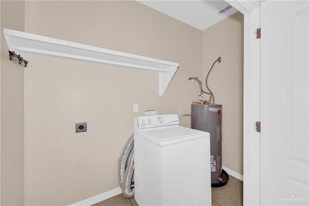 3700 South Embassy Avenue, Unit 1 Pharr, TX 78577 - Photo 11 of 12 a utility room with dryer and washer