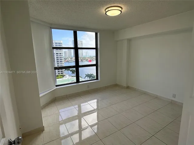 $455,000 | 3530 Mystic Pointe Drive, Unit 1213, Aventura, FL 33180
