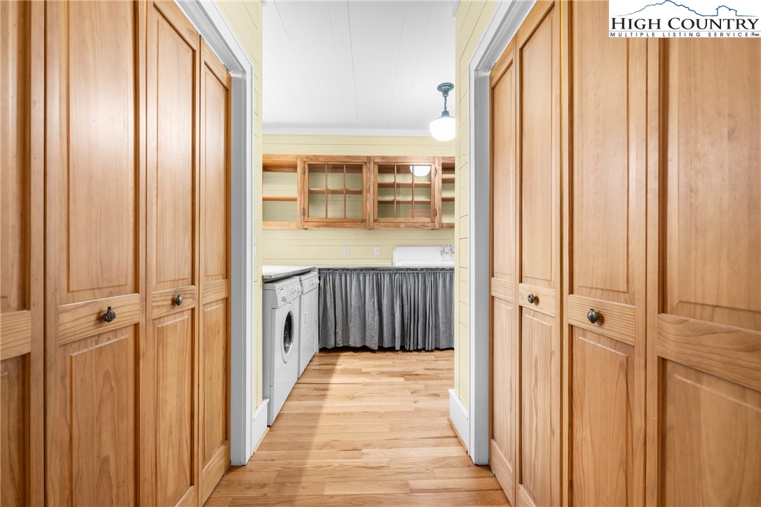 410-560 Puckett Road Banner Elk, NC 28604 - Photo 20 of 50 a view of a bathroom with sink and mirror