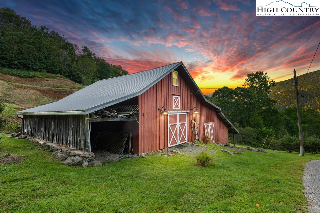 410-560 Puckett Road Banner Elk, NC 28604 - Photo 26 of 50 a view of a house with a yard