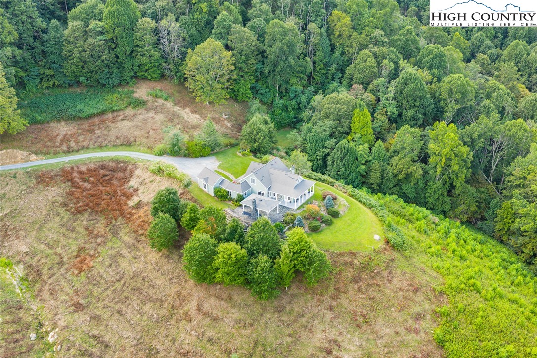 410-560 Puckett Road Banner Elk, NC 28604 - Photo 3 of 50 an aerial view of a house with a yard