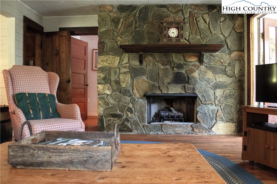 410-560 Puckett Road Banner Elk, NC 28604 - Photo 37 of 50 a living room with furniture and a fireplace