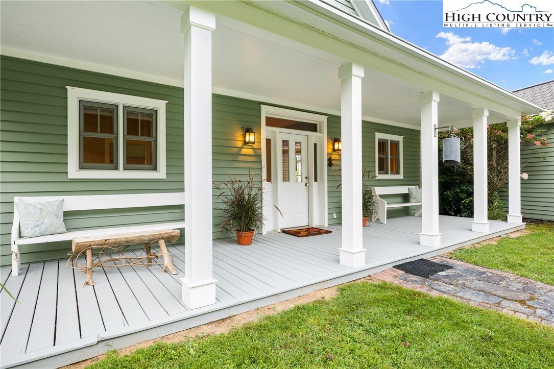 410-560 Puckett Road Banner Elk, NC 28604 - Photo 6 of 50 a view of house with backyard and porch