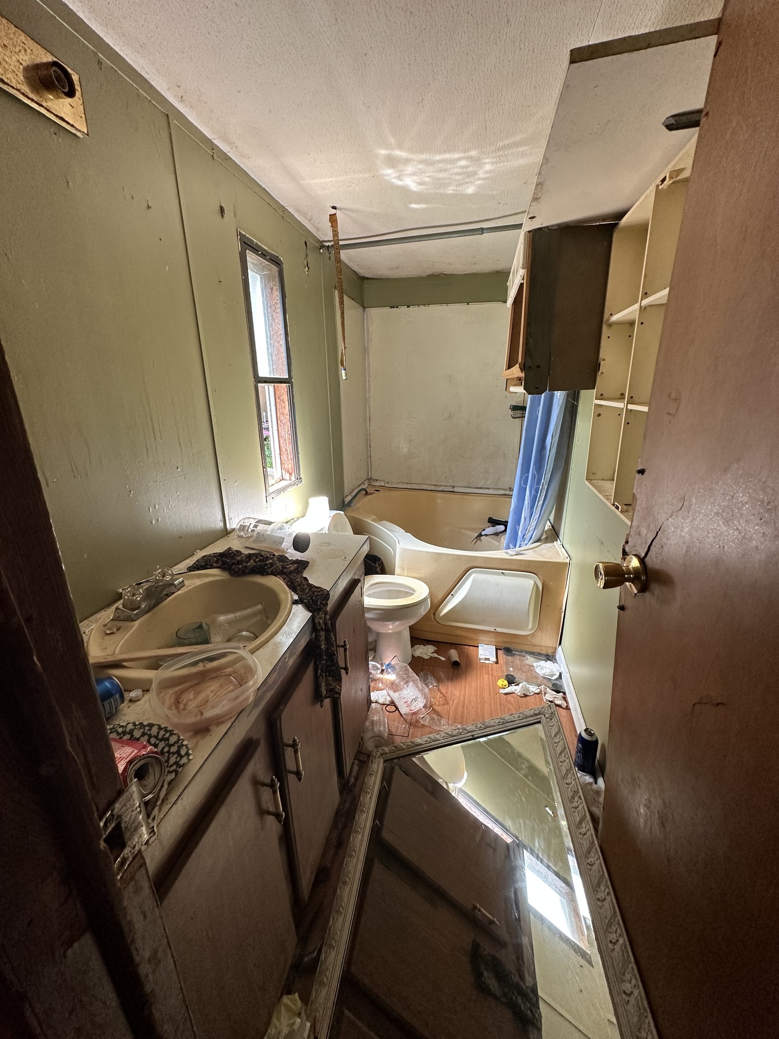 342 Omer Short Road Moss, TN 38575 - Photo 11 of 15 a bathroom with a granite countertop sink a toilet and mirror
