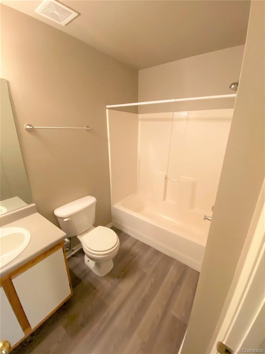 2226 West Elizabeth Street, Unit 202 Fort Collins, CO 80521 - Photo 9 of 9 a bathroom with a toilet and a shower