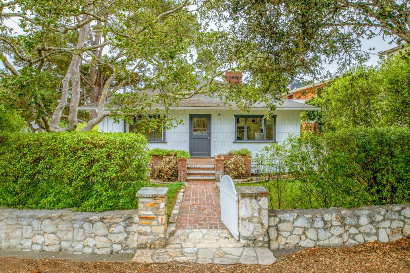 0 Northwest Nw Corner Carmel, CA 93921 - Photo 2 of 17 a front view of a house with garden