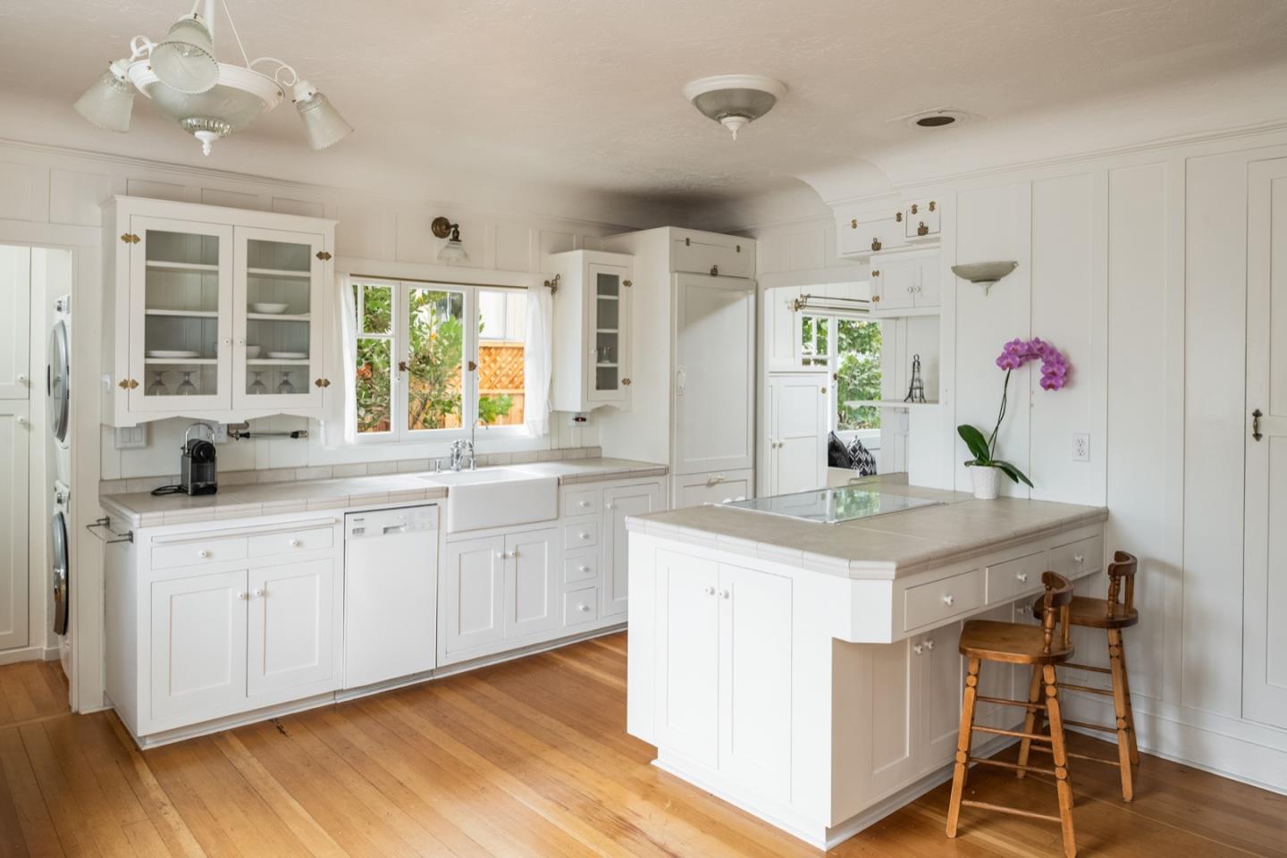 0 Northwest Nw Corner Carmel, CA 93921 - Photo 5 of 17 a kitchen with granite countertop a sink cabinets and wooden floor